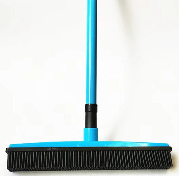 Blue broom with black bristles on a white background