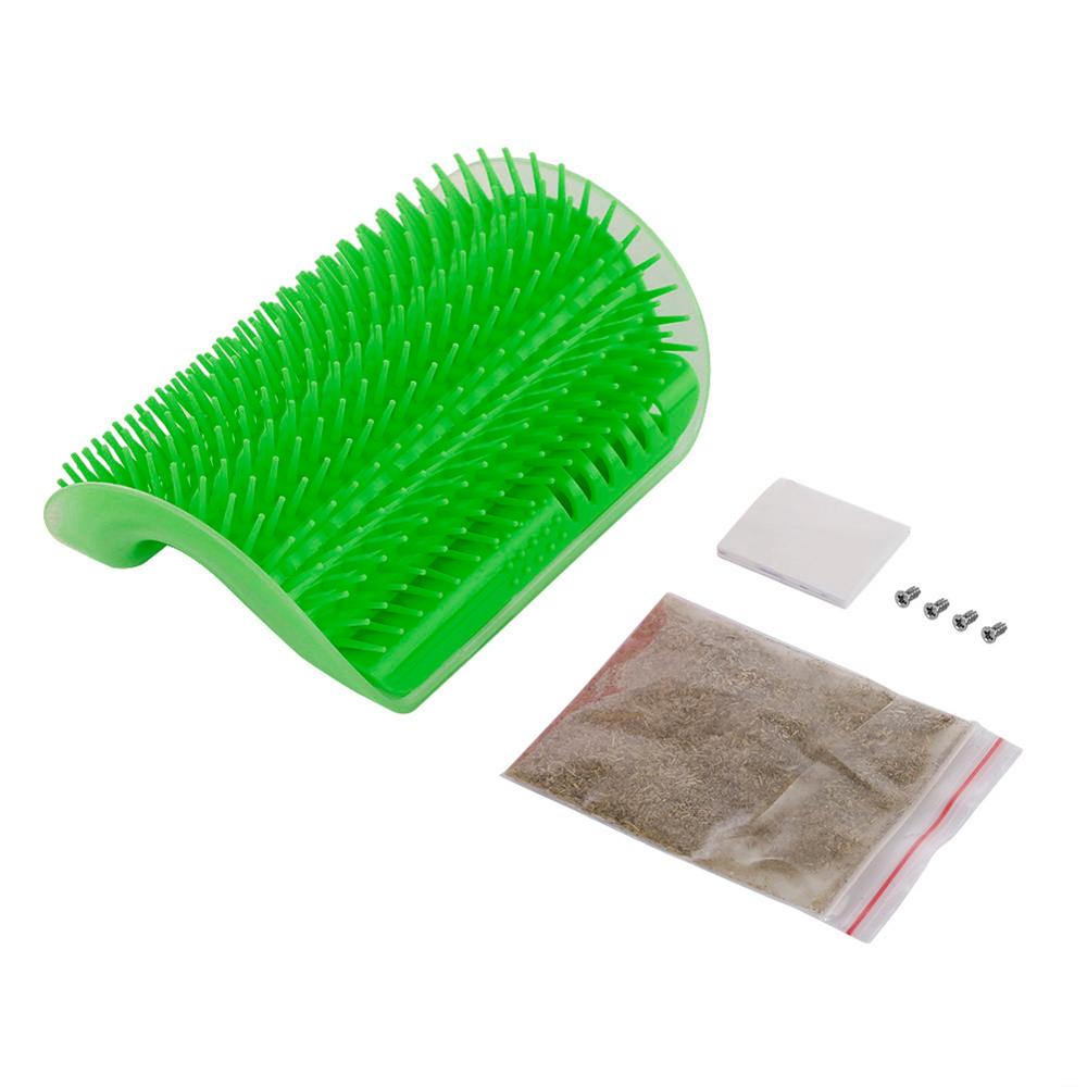 Green grooming brush with accessories on a white background