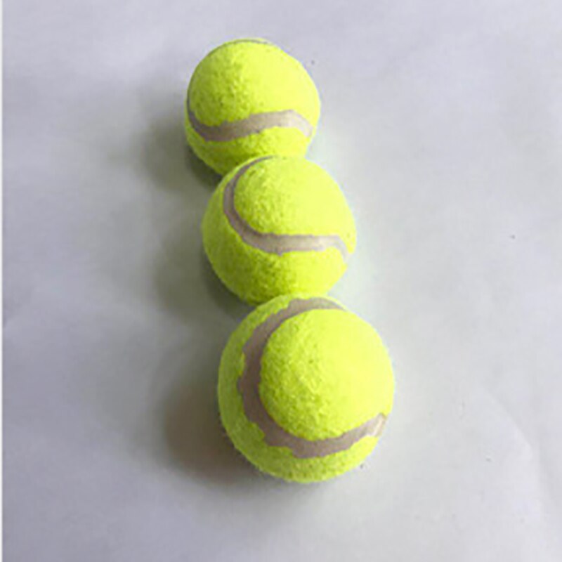 Three yellow tennis balls with white strings on a light gray background